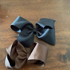 Bow set of 2 black and brown one is a wee ones brand.